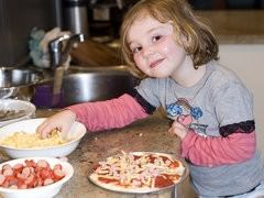 Child Preparing Pizza