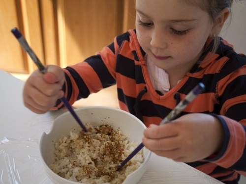 Mixing the seasoning into rice