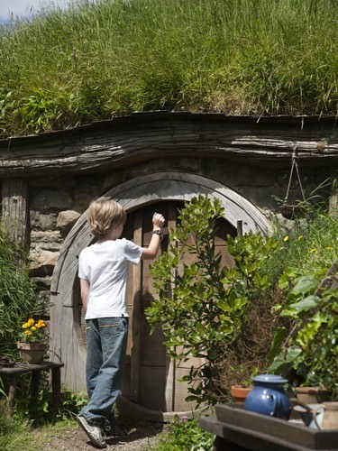 Locky knocking on the door of a Hobbit home Locky knocking on the door of a Hobbit home