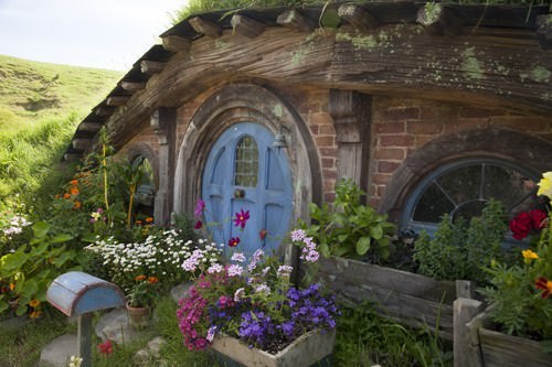 cute Hobbit home Hobbit Home bricks and flowers