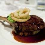 Plated Steak and Deep fried Onion rings