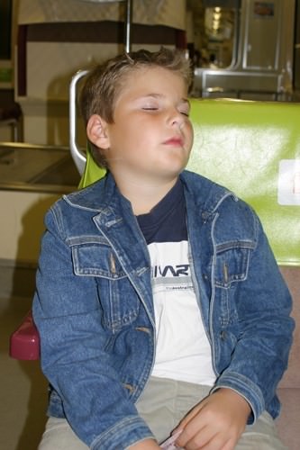 Mani Asleep on the Train