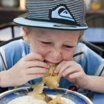 Lachlan Eating Potato Masala Poori