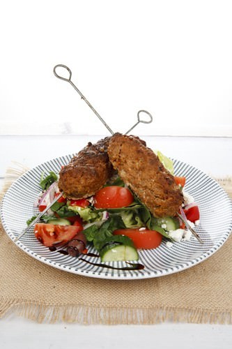 Lamb Souvlaki and Greek Salad ready to eat Lamb Souvlaki and Greek Salad ready to eat