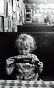 Image from Texas BBQ - The Authors Daughter eating Dino Ribs in Texas