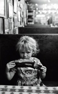 Image from Texas BBQ - The Authors Daughter eating Dino Ribs in Texas Image from Texas BBQ - The Authors Daughter eating Dino Ribs in Texas