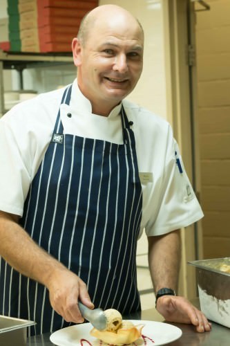 Sous Chef Mark Gibbs Scooping Pecan Ice Cream 