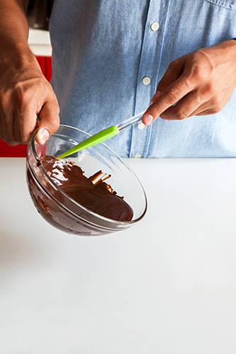 Temper Chocolate 2 - Spreading the chocolate onto marble board Temper Chocolate 2 - Spreading the chocolate onto marble board