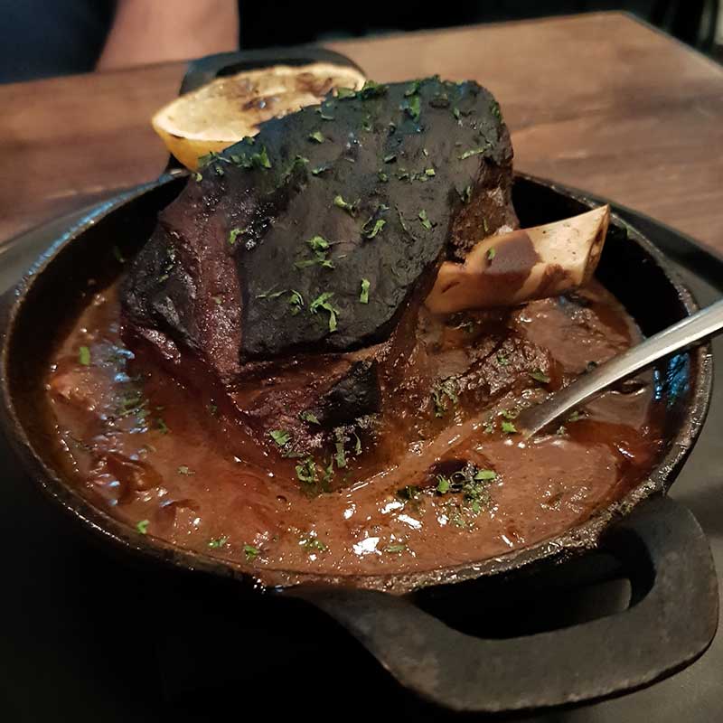Meatmaiden Bar & Grill - Saltbush Lamb Shoulder with smoked tomato and confit garlic.